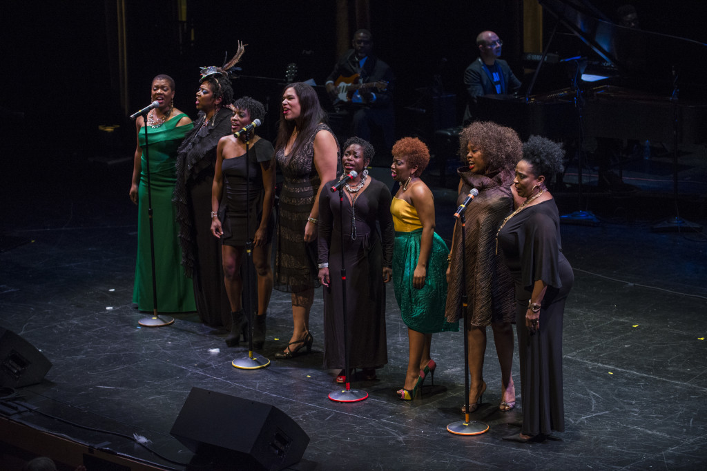 (From L to R) Lili-Anne Brown, Lynne Jordan, Monique Haley, Bethany Thomas, Karla Beard-Leroy, Alexis J. Rogers, Dee Alexander, and E. Faye Butler singing Four Women at the Chicago Humanities Festival production of Four Women on Monday, Nov. 2 at Francis W Parker School, as part of the 2015 Fall Festival, Citizens. Photo by Michael Brosilow.